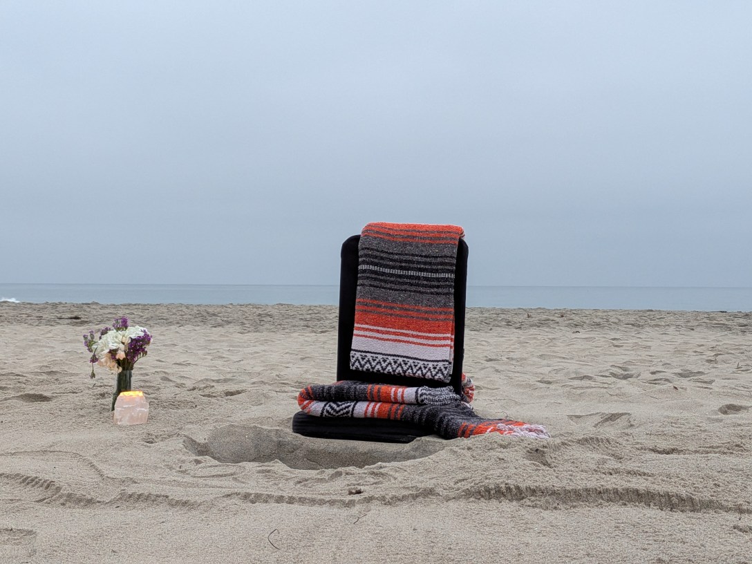 Meditation chair on beach at dusk — nervous system regulation and decision-making under pressure